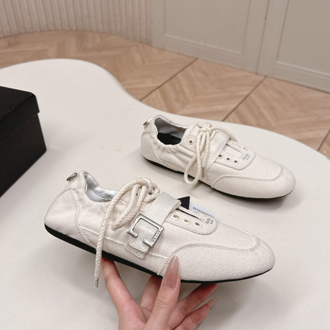 PRADA 26S LACE UP MINIMAL SNEAKERS IN WHITE CANVAS
