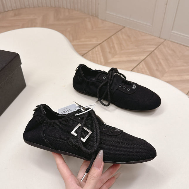 PRADA 26S LACE UP MINIMAL SNEAKERS IN BLACK CANVAS
