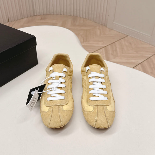 PRADA 26S SNEAKERS IN YELLOW QUILTED NYLON AND SUEDE
