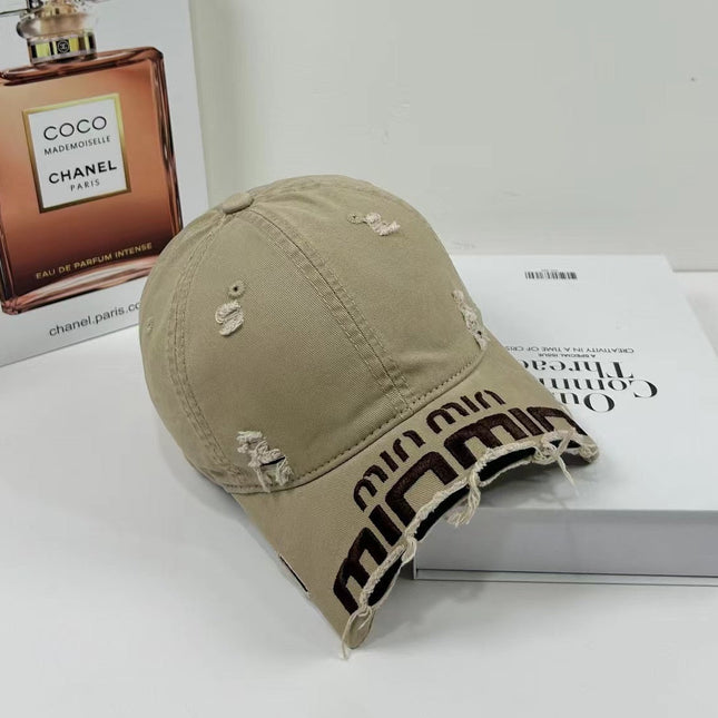 MIUMIU DISTRESSED EMBROIDERED BASEBALL CAP DENIM