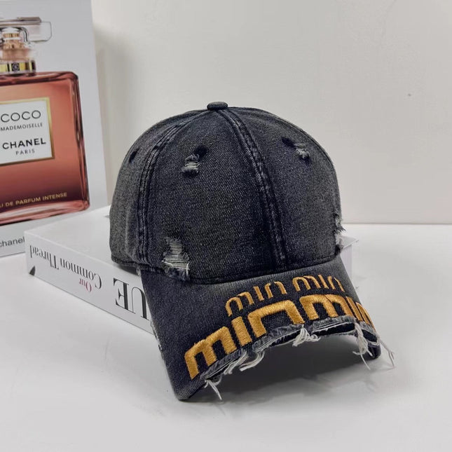 MIUMIU DISTRESSED EMBROIDERED BASEBALL CAP DENIM