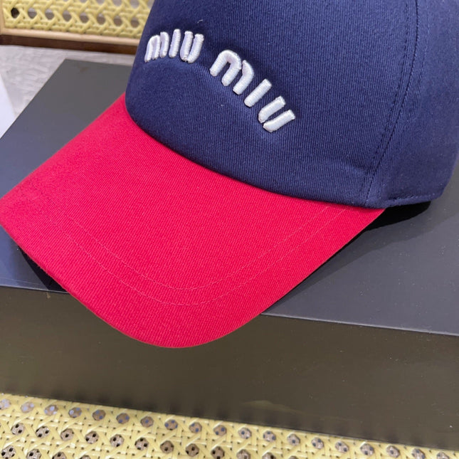 MIUMIU BASEBALL CAP IN NAVY BLUE AND RED FABRIC WITH LOGO EMBROIDERY