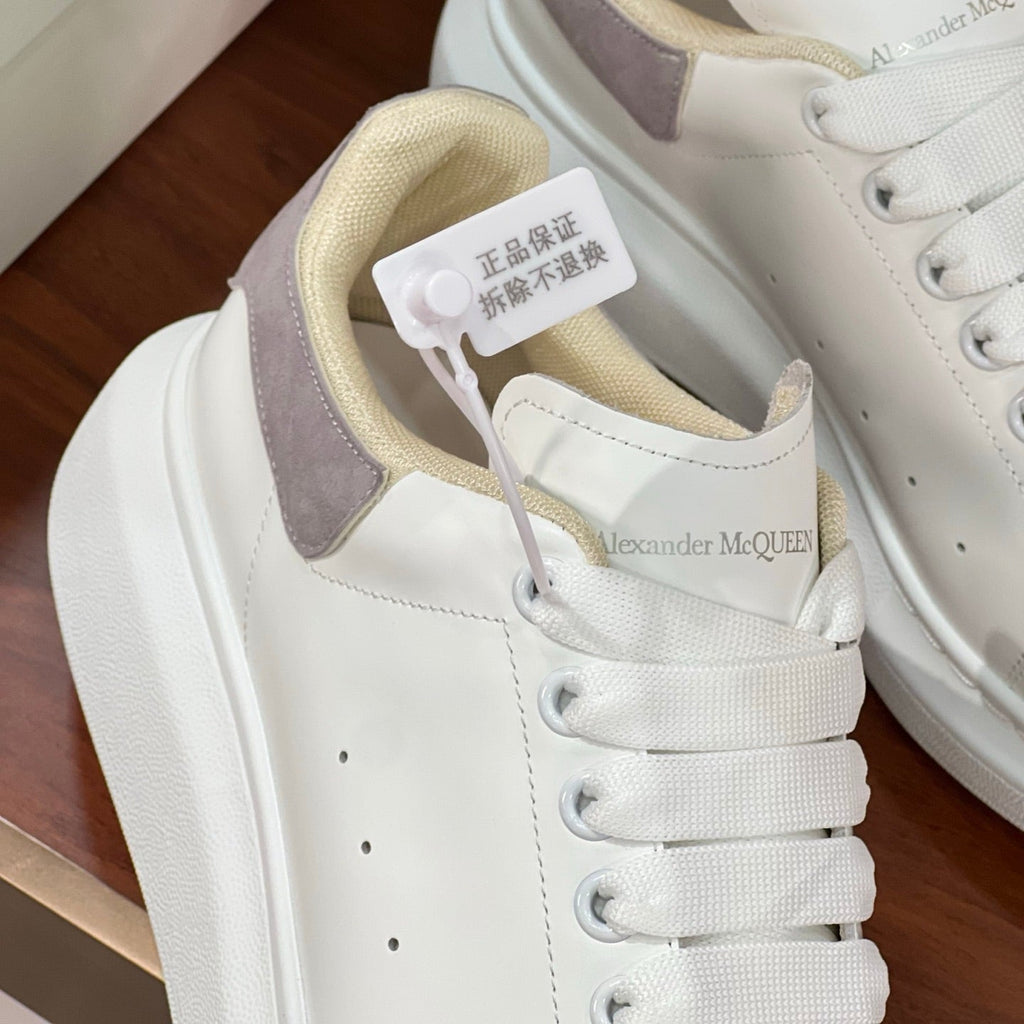 OVERSIZED SNEAKERS IN WHITE CALFSKIN WITH THISTLE PURPLE SUEDE HEEL TAB