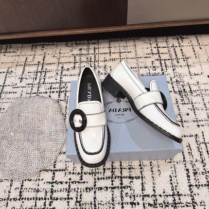 PRADA 26S BUCKLED LOAFERS IN WHITE CALFSKIN