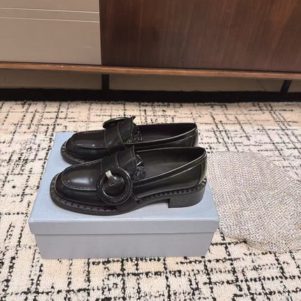 PRADA 26S BUCKLED LOAFERS IN BLACK SHINY CALFSKIN