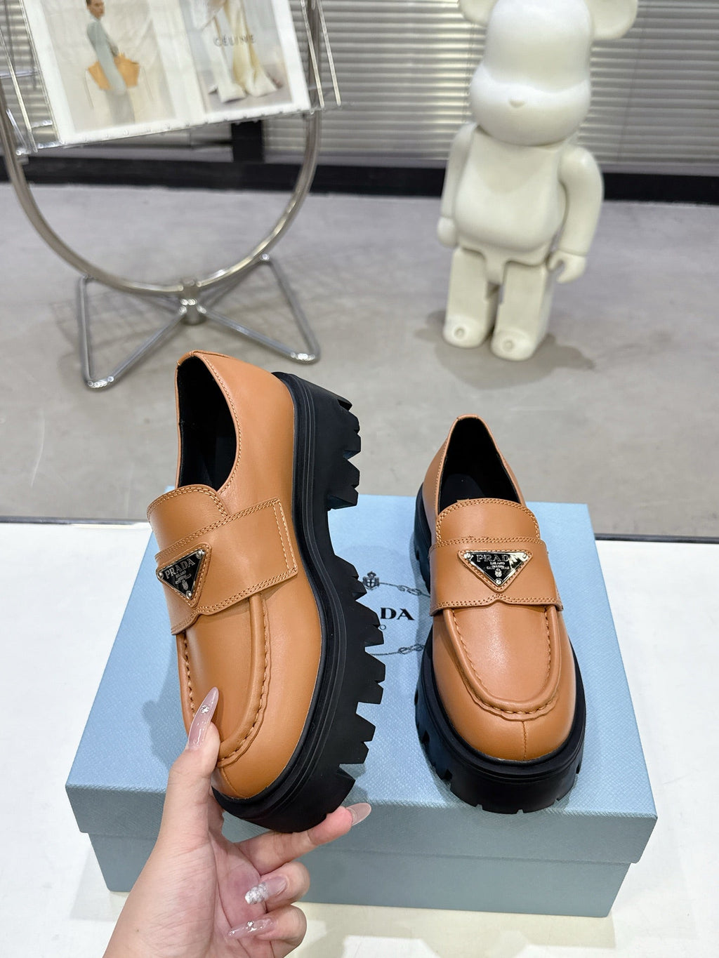 PRADA 25S THICK-SOLE LOAFERS 60 MM IN COGNAC BROWN CALFSKIN