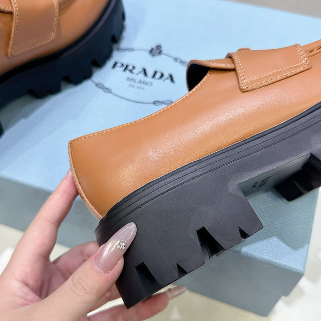 PRADA 25S THICK-SOLE LOAFERS 60 MM IN COGNAC BROWN CALFSKIN