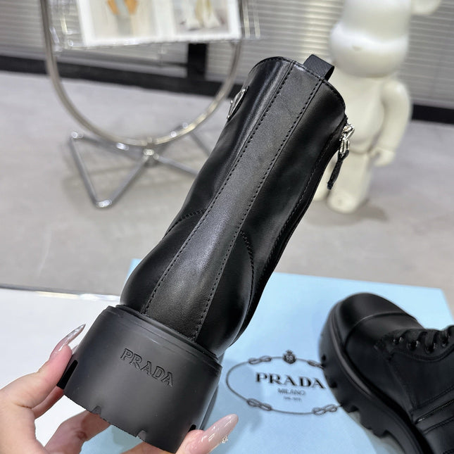 PRADA 25S WARRIOR BOOTS IN BLACK CALFSKIN