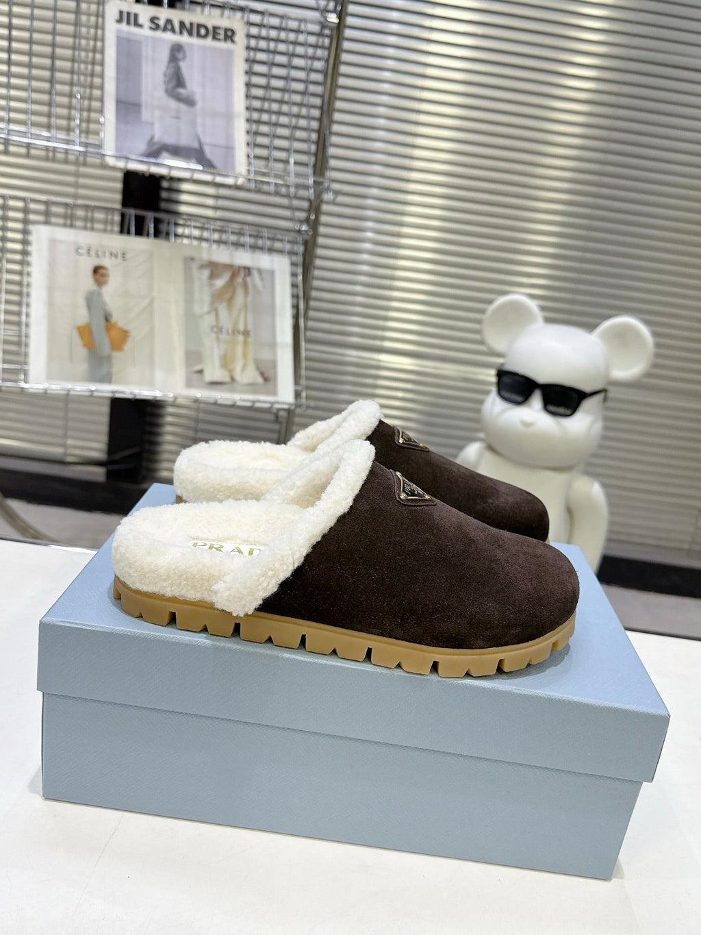 PRADA 25S FUR-LINED MULES IN DARK BROWN SUEDE