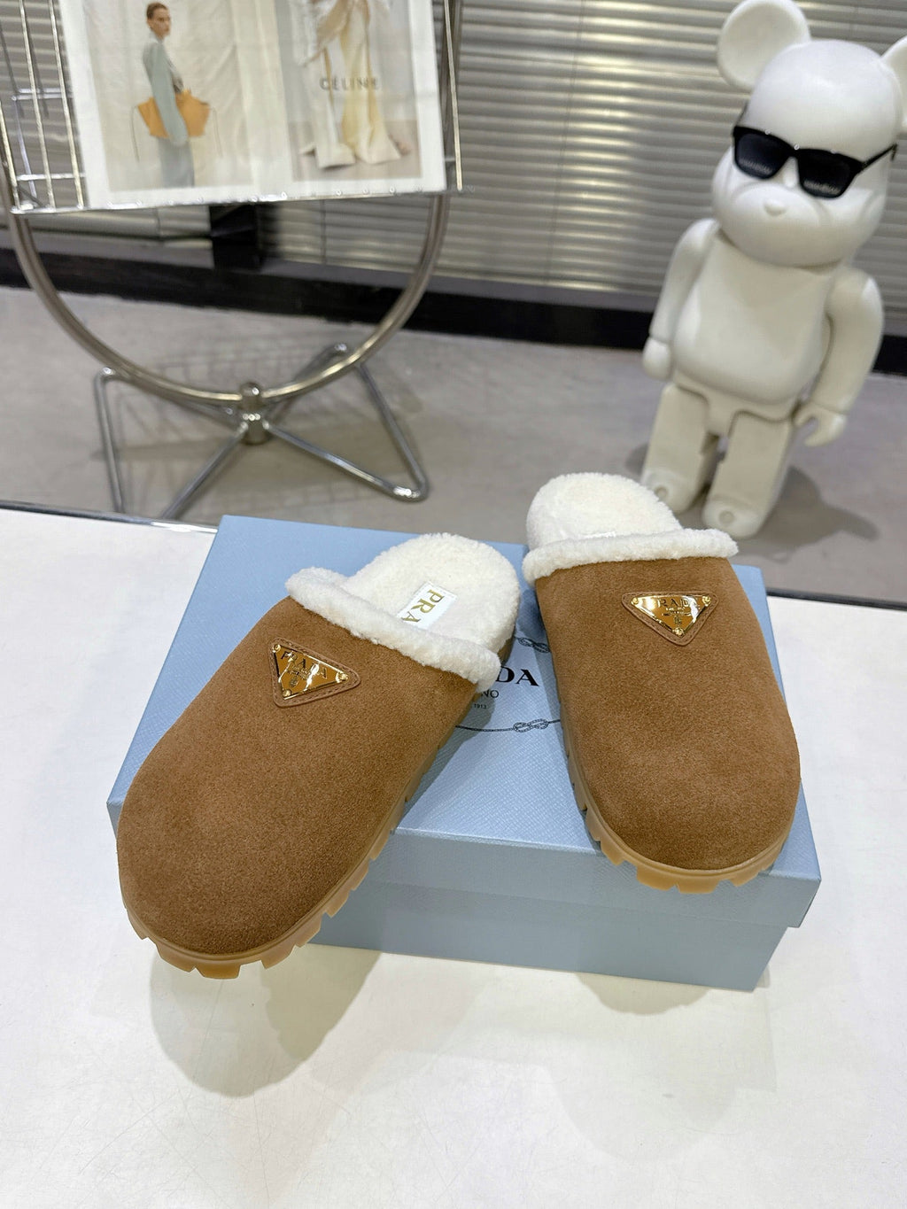 PRADA 25S FUR-LINED MULES IN BROWN SUEDE