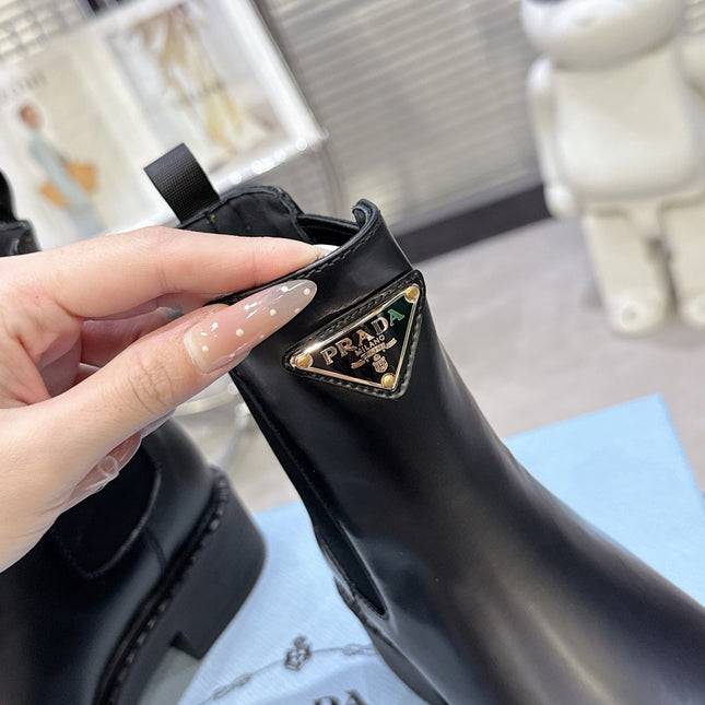 PRADA 25S RETRO PLATFORM MARTIN BOOTS IN BLACK CALFSKIN