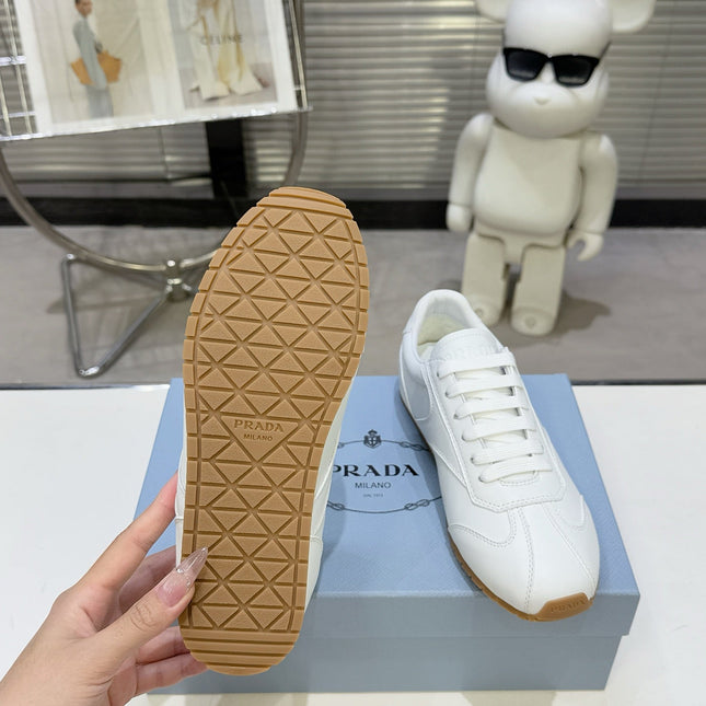 PRADA 26S LACE UP SNEAKERS IN WHITE CALFSKIN