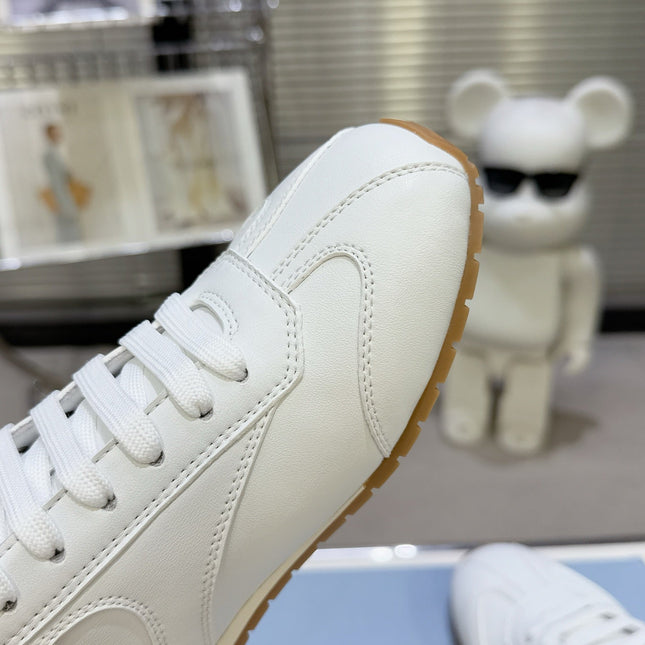 PRADA 26S LACE UP SNEAKERS IN WHITE CALFSKIN