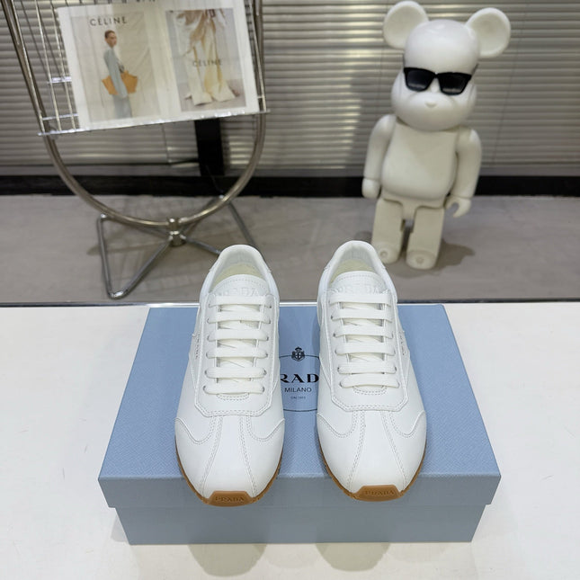 PRADA 26S LACE UP SNEAKERS IN WHITE CALFSKIN