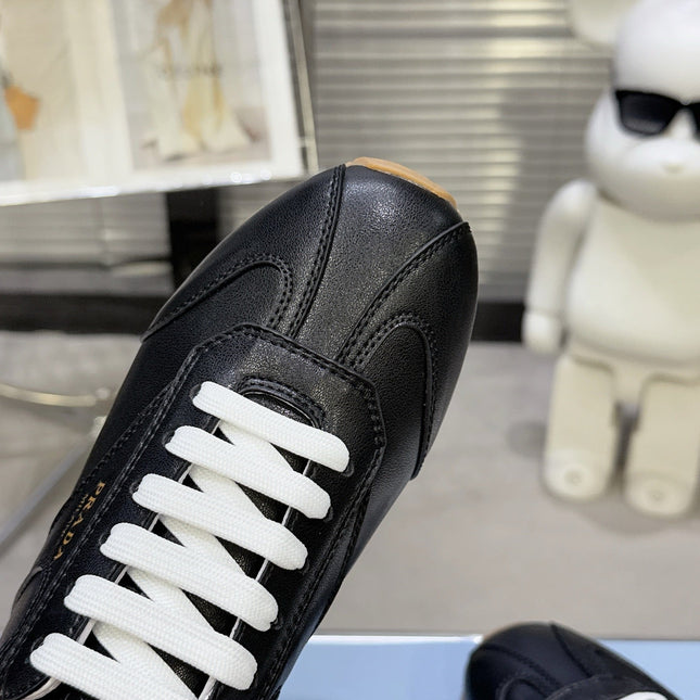 PRADA 26S LACE UP SNEAKERS IN BLACK CALFSKIN