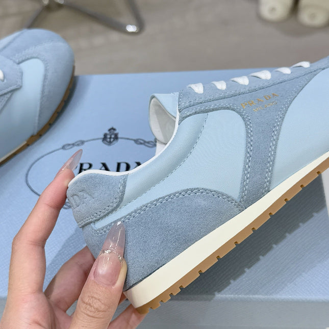PRADA 26S LACE UP SNEAKERS IN LIGHT BLUE NYLON AND SUEDE
