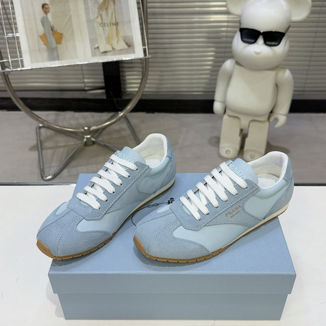 PRADA 26S LACE UP SNEAKERS IN LIGHT BLUE NYLON AND SUEDE