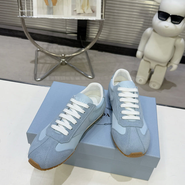 PRADA 26S LACE UP SNEAKERS IN LIGHT BLUE NYLON AND SUEDE