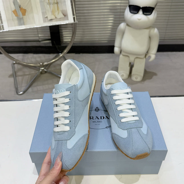 PRADA 26S LACE UP SNEAKERS IN LIGHT BLUE NYLON AND SUEDE