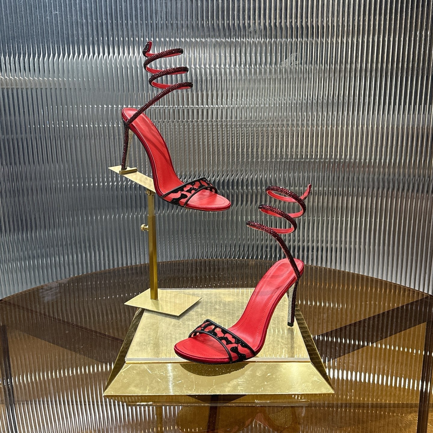RENE CAOVILLA 26S TWISTED-STRAP HIGH-HEEL SANDALS 100 MM IN BLACK MESH AND RED LAMBSKIN