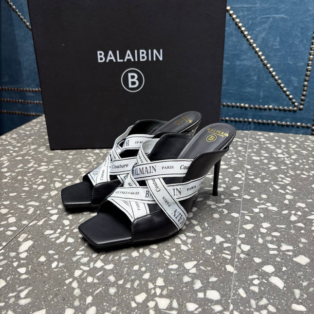 BALMAIN 26S HIGH-HEEL SANDALS 95 MM IN BLACK CALFSKIN AND WHITE FABRIC