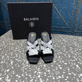 BALMAIN 26S HIGH-HEEL SANDALS 95 MM IN BLACK CALFSKIN AND WHITE FABRIC