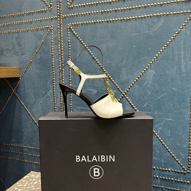 BALMAIN 26S HIGH-HEEL SANDALS 95 MM IN BLACK AND WHITE CALFSKIN