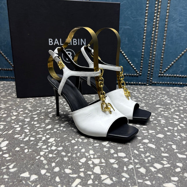 BALMAIN 26S HIGH-HEEL SANDALS 95 MM IN BLACK AND WHITE CALFSKIN
