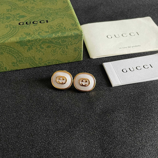 GUCCI 26S INTERLOCKING G ROUND LOGO STUD EARRINGS IN WHITE ENAMEL & GOLD TONE METAL 625717