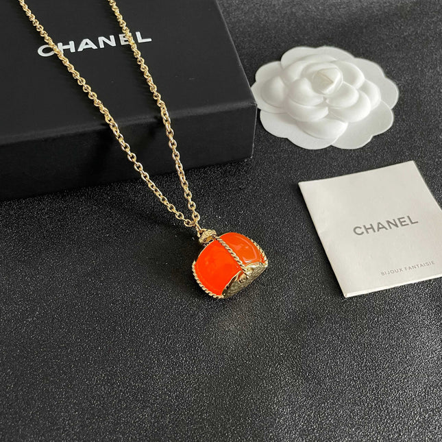 CHANEL 26S DOUBLE C LOGO ORANGE RESIN STATEMENT PENDANT NECKLACE IN GOLD METAL 629172