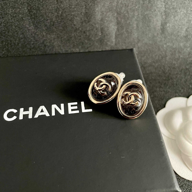 CHANEL 26S DOUBLE C LOGO BLACK ENAMEL OVAL STUD EARRINGS IN GOLD METAL 629155