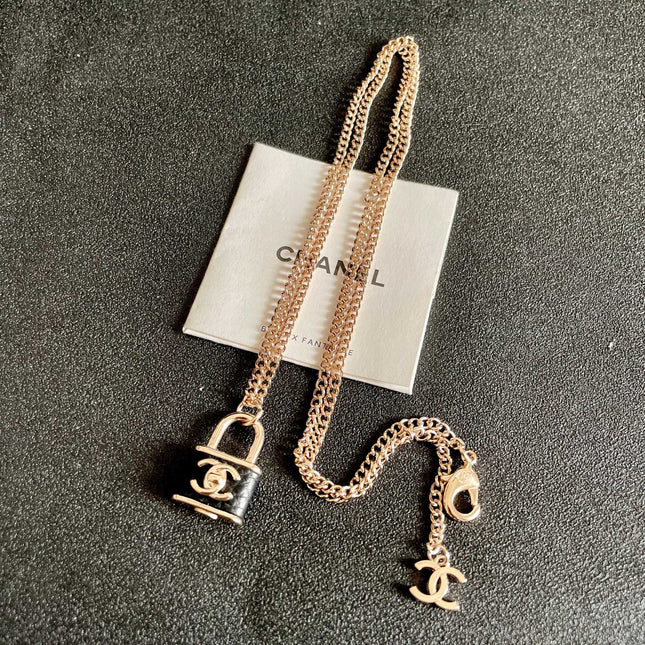 CHANEL 26S DOUBLE C LOGO PADLOCK CHAIN NECKLACE IN GOLD & BLACK METAL 629974