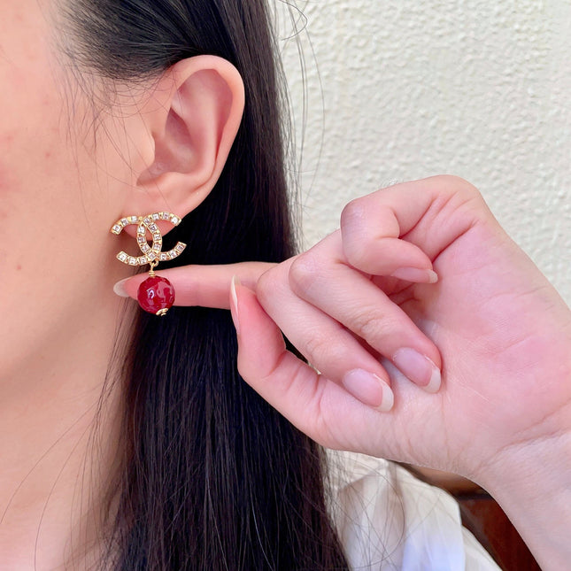CHANEL 26S DOUBLE C LOGO CRYSTAL & RED BEAD DROP EARRINGS IN GOLD METAL 629983