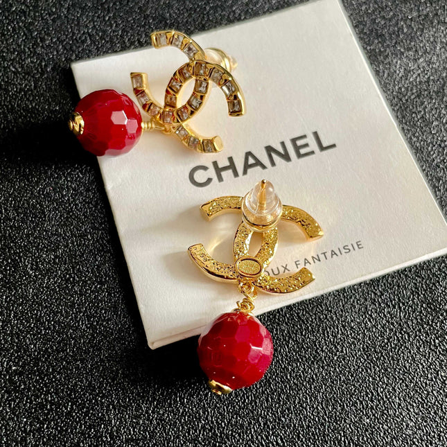 CHANEL 26S DOUBLE C LOGO CRYSTAL & RED BEAD DROP EARRINGS IN GOLD METAL 629983