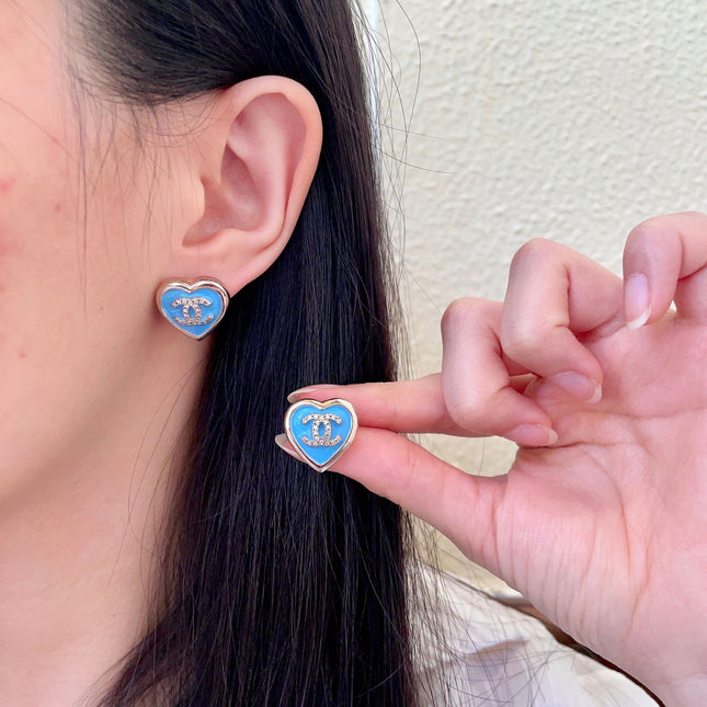 CHANEL 26S DOUBLE C LOGO BLUE HEART ENAMEL STUD EARRINGS IN GOLD METAL 629986