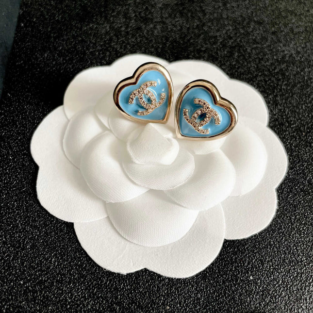 CHANEL 26S DOUBLE C LOGO BLUE HEART ENAMEL STUD EARRINGS IN GOLD METAL 629986