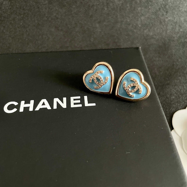 CHANEL 26S DOUBLE C LOGO BLUE HEART ENAMEL STUD EARRINGS IN GOLD METAL 629986
