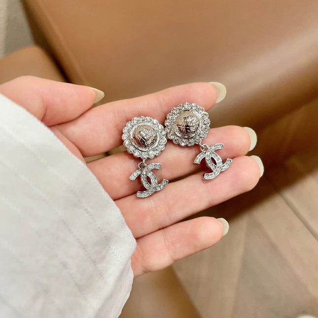 CHANEL 26S DOUBLE C LOGO CRYSTAL HALO DROP EARRINGS IN SILVER METAL 629987
