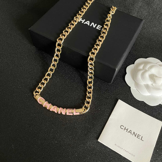 CHANEL 26S CHANEL LETTER LOGO ENAMEL CHAIN NECKLACE IN GOLD METAL WITH CC CHARM 630062