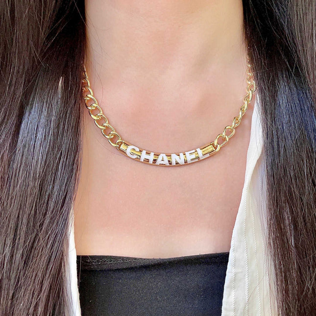 CHANEL 26S CHANEL LETTER LOGO CHAIN NECKLACE IN GOLD METAL WITH CC CHARM 630063