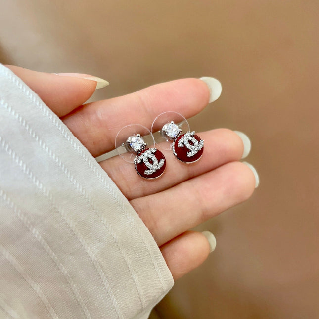 CHANEL 26S DOUBLE C LOGO RED ENAMEL CRYSTAL DROP STUD EARRINGS IN SILVER METAL 630074