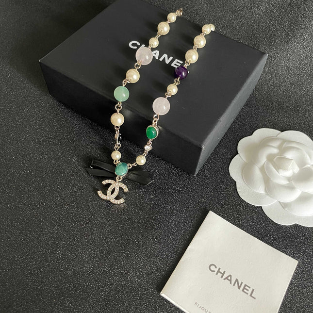 CHANEL 26S DOUBLE C LOGO MULTICOLOR GEMSTONE PEARL CHAIN BRACELET WITH CRYSTAL PENDANT IN GOLD METAL 629888