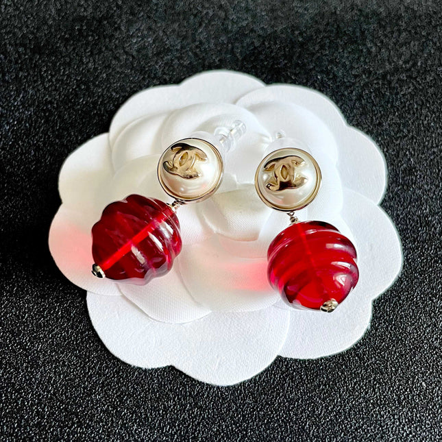 CHANEL 26S DOUBLE C LOGO PEARL STUD EARRINGS WITH RED GLASS DROP IN GOLD METAL 629893