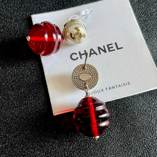 CHANEL 26S DOUBLE C LOGO PEARL STUD EARRINGS WITH RED GLASS DROP IN GOLD METAL 629893