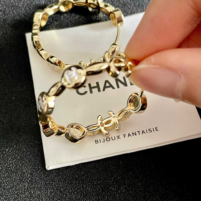 CHANEL 26S DOUBLE C LOGO WHITE ENAMEL & CRYSTAL LINK HOOP EARRINGS IN GOLD METAL 629898