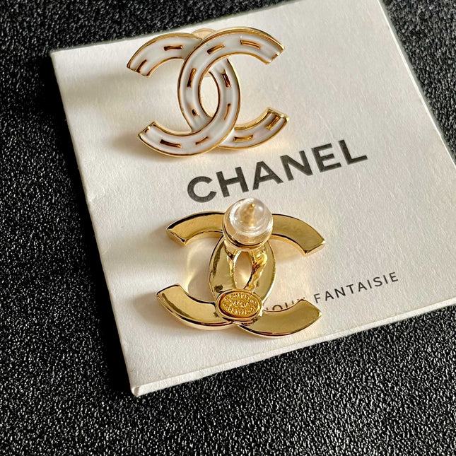 CHANEL 26S DOUBLE C LOGO WHITE ENAMEL STUD EARRINGS IN GOLD METAL 629903