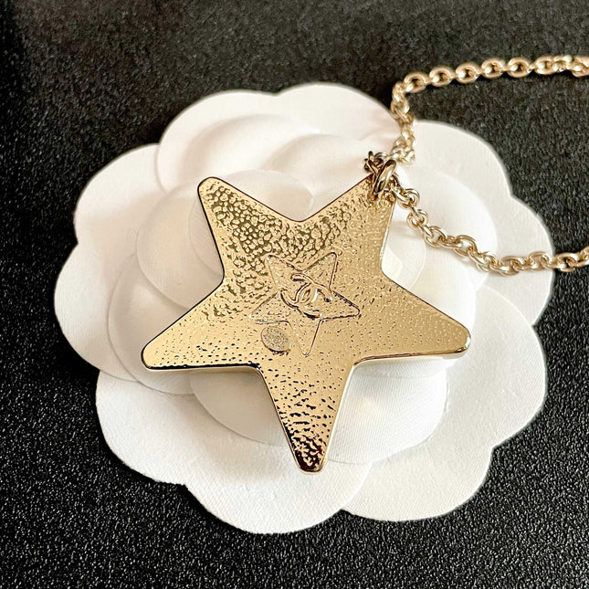 CHANEL 26S DOUBLE C LOGO BLACK ENAMEL STAR PENDANT NECKLACE WITH CRYSTAL DETAIL IN GOLD METAL 631015