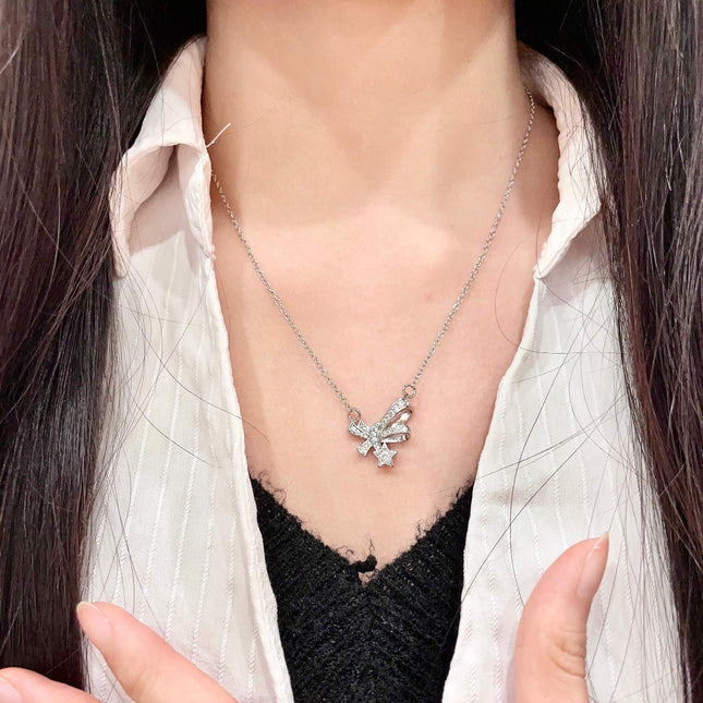 CHANEL 26S DOUBLE C LOGO CRYSTAL BOW & STAR PENDANT NECKLACE IN SILVER METAL 631019