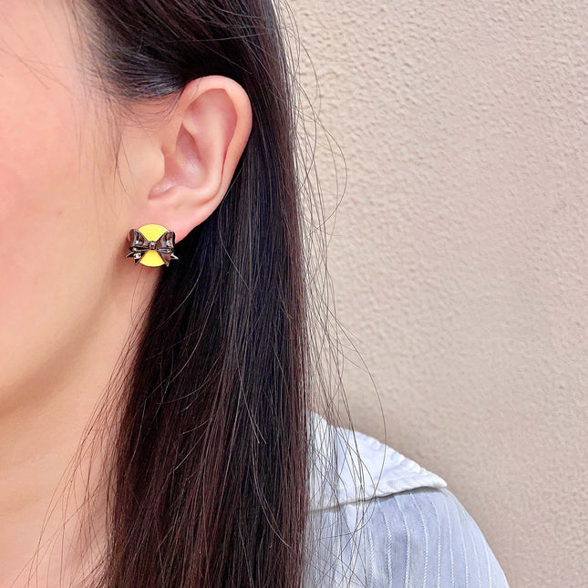 CHANEL 26S DOUBLE C LOGO BLACK BOW YELLOW ENAMEL ROUND STUD EARRINGS IN GOLD METAL 631024