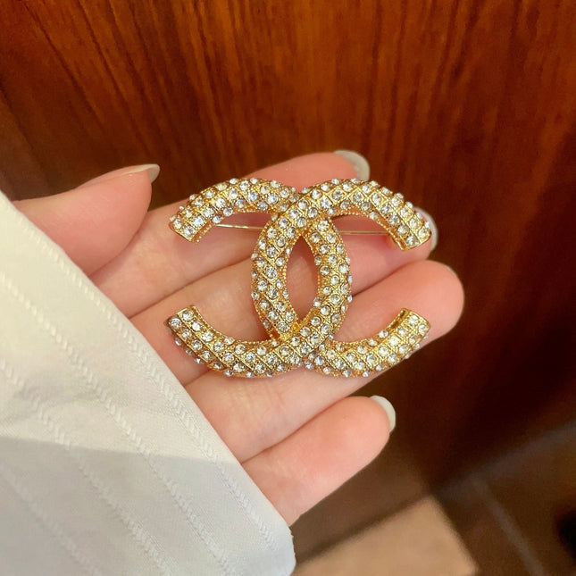 CHANEL 26S DOUBLE C LOGO PAVE CRYSTAL BROOCH IN GOLD METAL 631041